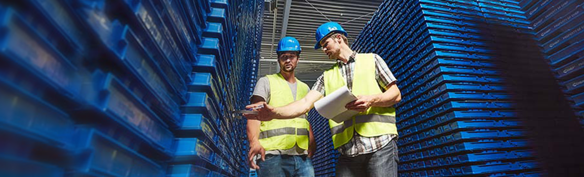 A banner image features a close-up photograph of two caucasian CHEP workmen in fluorescent vests and hard hats in a warehouse full of pallets. The men are observing a clipboard and paper beside a stack of blue chep pallets.