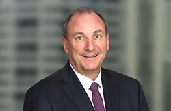 A portrait photograph of Brambles' Non-Executive Chairman, Stephen Johns