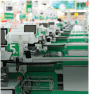 An image of many green shop checkout booths